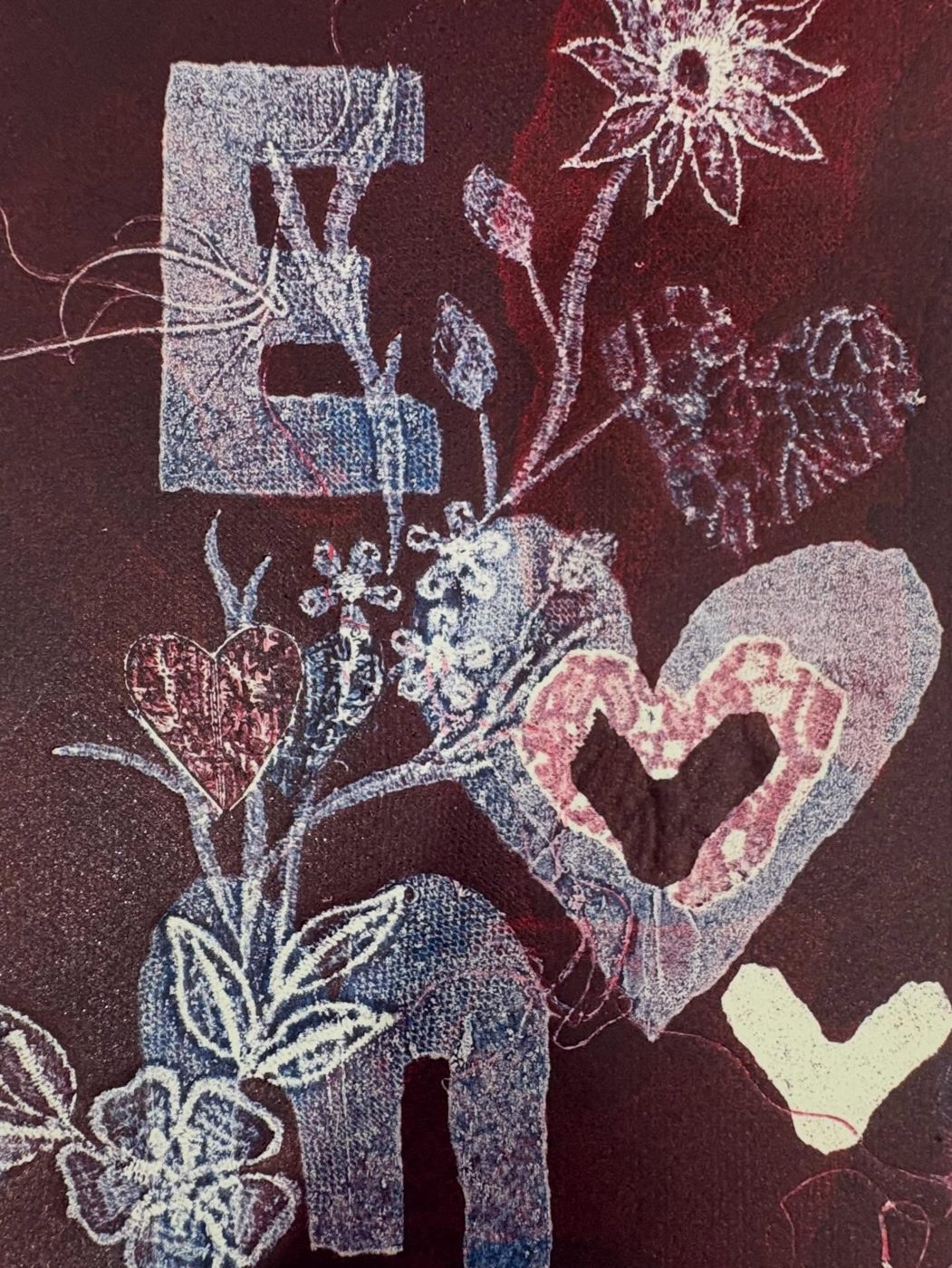 A crimson monotype of flowers